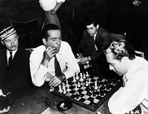 Cast members of "Casablanca" were known to spend down time enjoying competitive games of chess. In fact, it is said that while watching Bergman play, Bogart uttered "Here's looking at you", a phrase that he would bring into the movie via improvisation. Of course that line would become one of the film's many memorable quotes.
